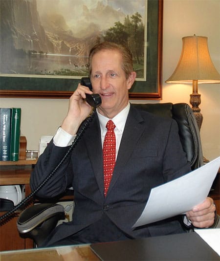 Attorney Michael K. Ruberg talking on a phone
